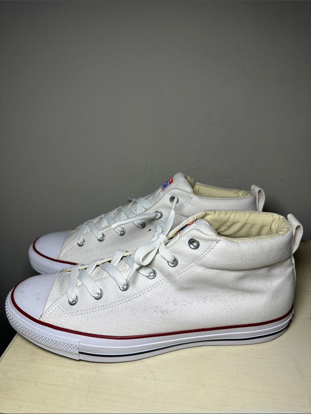 Converse White mid top Chuck Taylor shoes